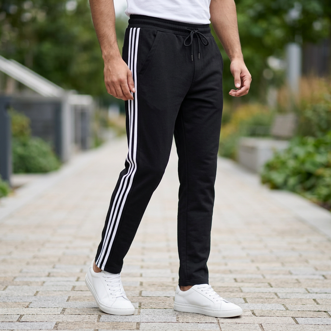 Men's Black Striped Track Pants with White Sneakers - Image 2