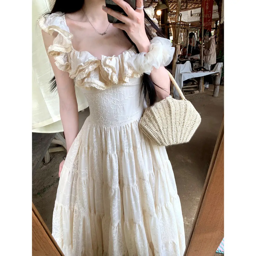 A Sweet Peach-Colored Yikett "Santorini" Heavy-Duty, Extra-Large Skirt Hem, Cinched Waist, Strap Dress for Women, Vacation Dress