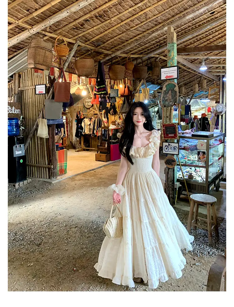 A Sweet Peach-Colored Yikett "Santorini" Heavy-Duty, Extra-Large Skirt Hem, Cinched Waist, Strap Dress for Women, Vacation Dress — feature 13