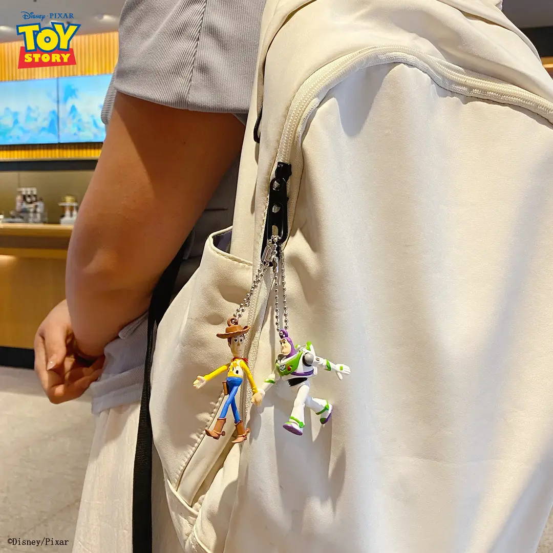 Authentic Toy Story Hand-In-Hand Couple Keychain Cartoon Woody and Buzz Lightyear Doll Keychain Pendant