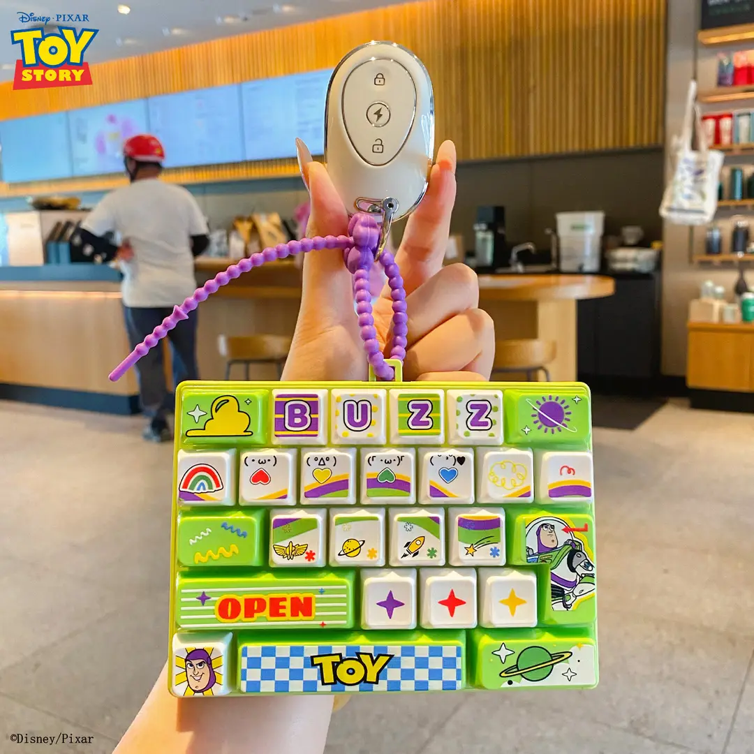 Authentic Toy Story 26-Key Keyboard with Pressable Keys, Portable Creative Stress-Relief Fingertip Toy, Student Pendant