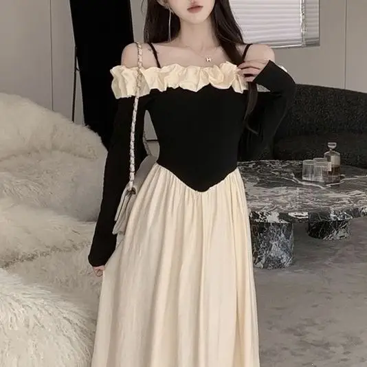 2026 One-shoulder color-blocked strap dress for women, new autumn French-style slim-fit waist-cinching elegant long dress