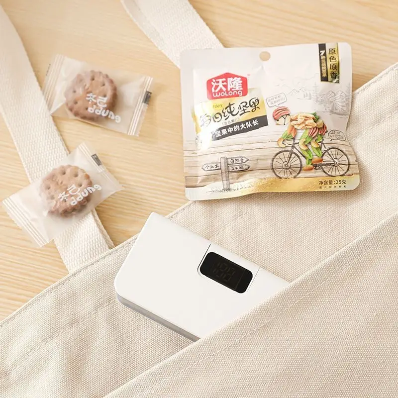 Cross-border rechargeable sealing machine, mini small snack sealer, plastic bag food preservation bag heat sealing machine for home use — feature 19