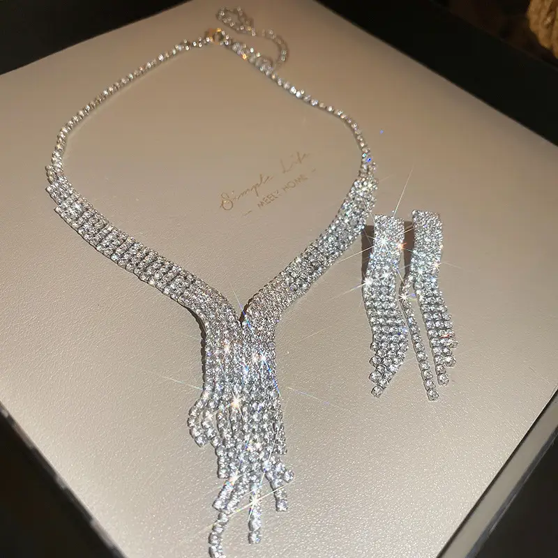 European and American style, featuring diamond-studded teardrop and geometric earrings and a necklace set, with a retro, courtly aesthetic, making it a fashionable and versatile accessory for women — feature 16