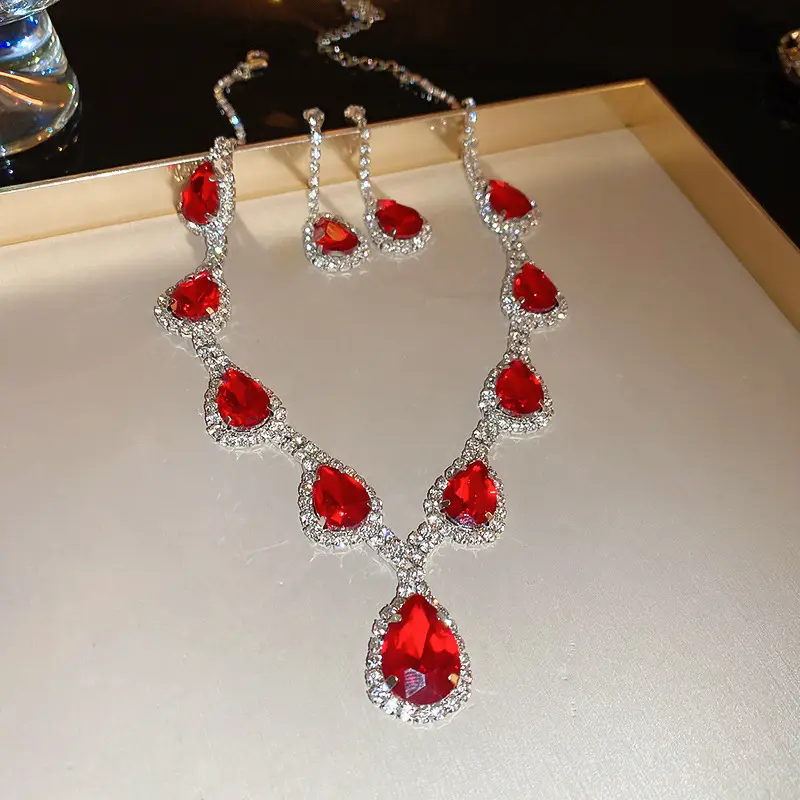 European and American style, featuring diamond-studded teardrop and geometric earrings and a necklace set, with a retro, courtly aesthetic, making it a fashionable and versatile accessory for women — feature 23