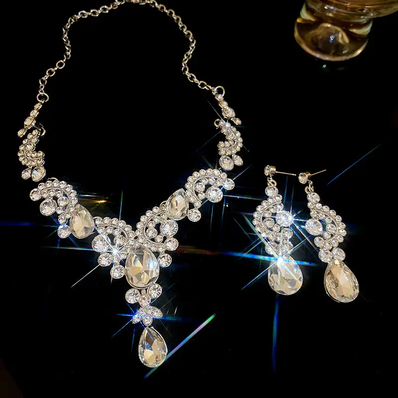 European and American style, featuring diamond-studded teardrop and geometric earrings and a necklace set, with a retro, courtly aesthetic, making it a fashionable and versatile accessory for women — feature 27