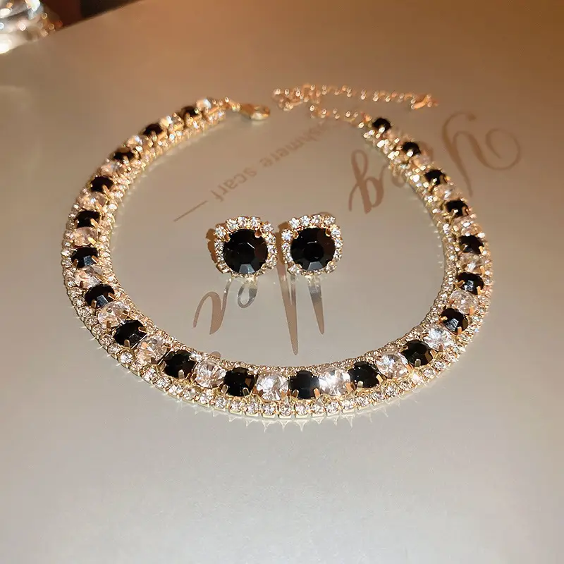 European and American style, featuring diamond-studded teardrop and geometric earrings and a necklace set, with a retro, courtly aesthetic, making it a fashionable and versatile accessory for women — feature 29
