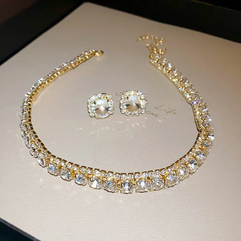 European and American style, featuring diamond-studded teardrop and geometric earrings and a necklace set, with a retro, courtly aesthetic, making it a fashionable and versatile accessory for women — feature 3