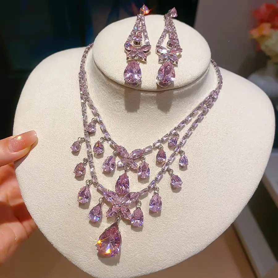 European and American style, featuring diamond-studded teardrop and geometric earrings and a necklace set, with a retro, courtly aesthetic, making it a fashionable and versatile accessory for women