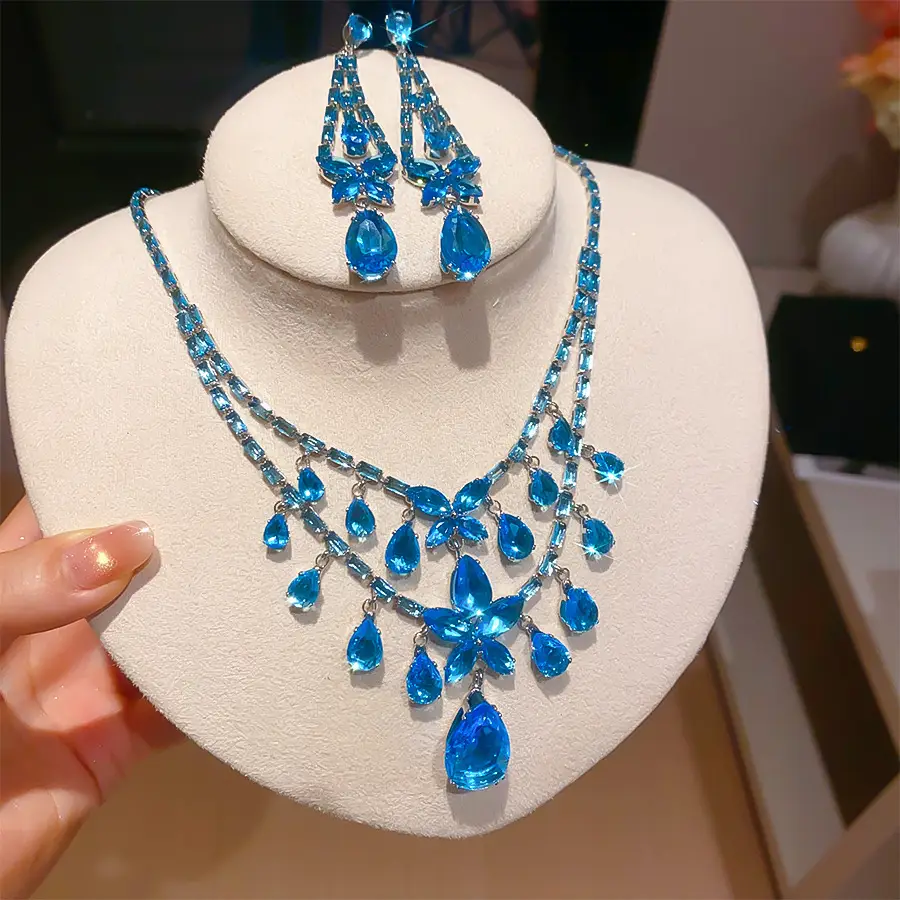 European and American style, featuring diamond-studded teardrop and geometric earrings and a necklace set, with a retro, courtly aesthetic, making it a fashionable and versatile accessory for women