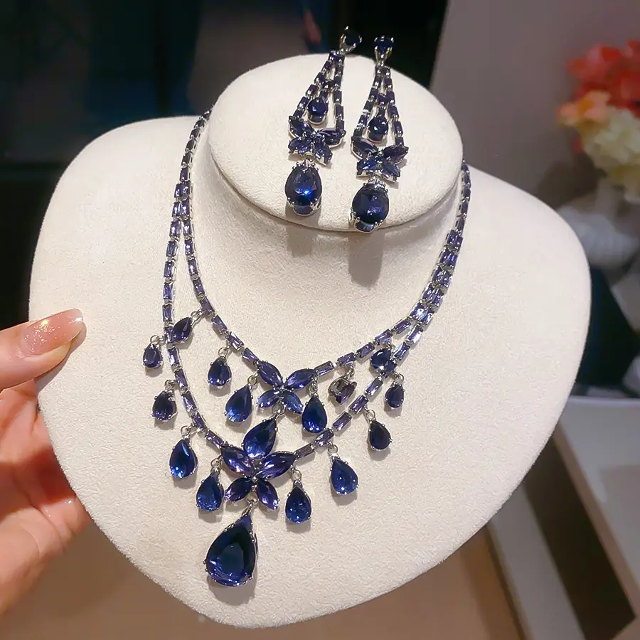 European and American style, featuring diamond-studded teardrop and geometric earrings and a necklace set, with a retro, courtly aesthetic, making it a fashionable and versatile accessory for women