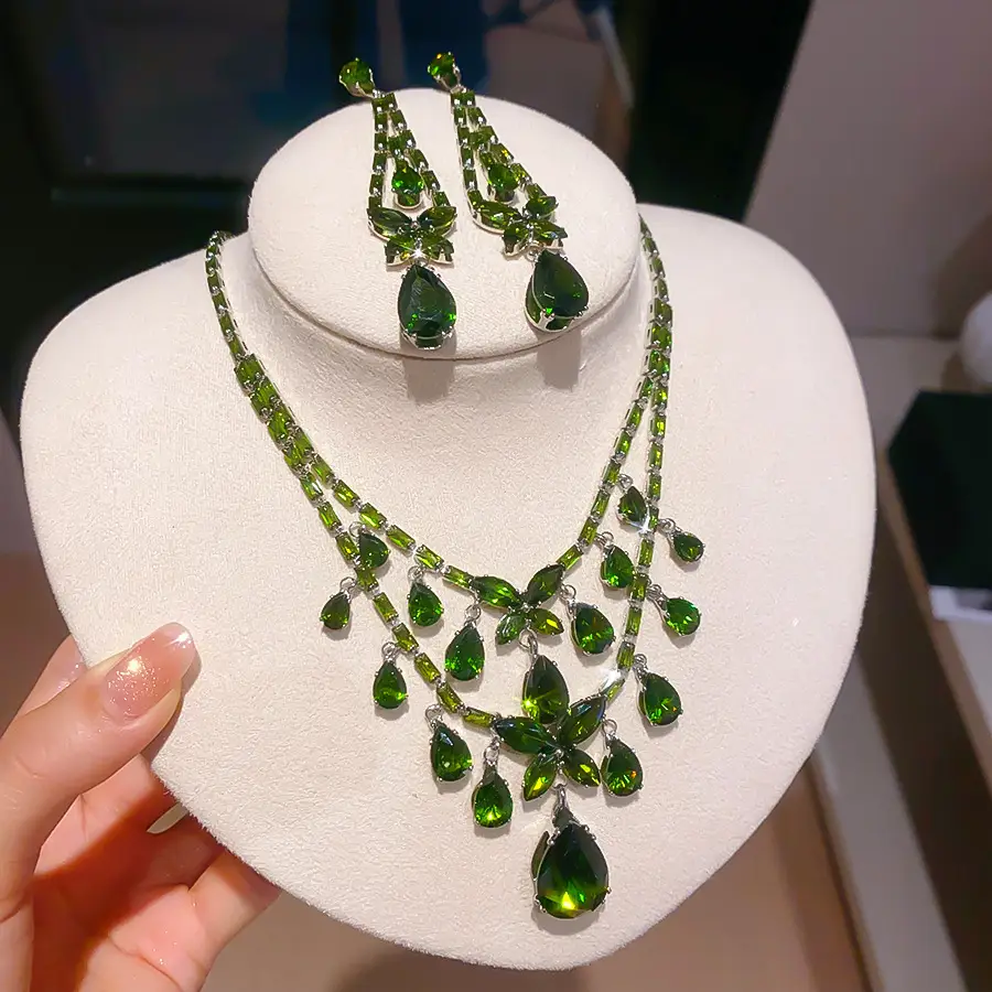 European and American style, featuring diamond-studded teardrop and geometric earrings and a necklace set, with a retro, courtly aesthetic, making it a fashionable and versatile accessory for women