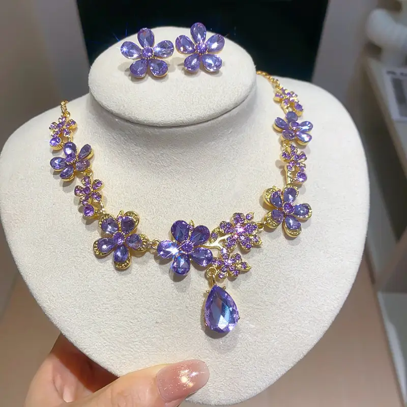 European and American style, featuring diamond-studded teardrop and geometric earrings and a necklace set, with a retro, courtly aesthetic, making it a fashionable and versatile accessory for women