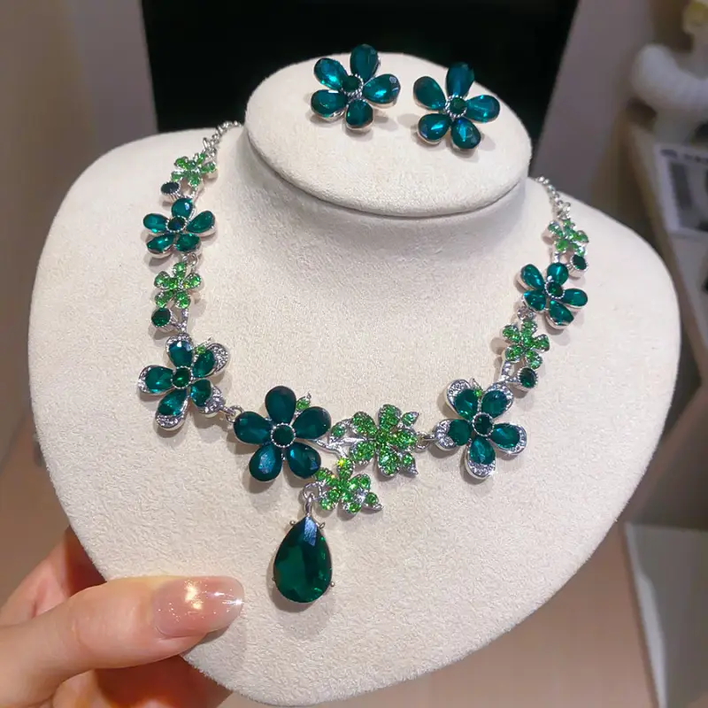 European and American style, featuring diamond-studded teardrop and geometric earrings and a necklace set, with a retro, courtly aesthetic, making it a fashionable and versatile accessory for women
