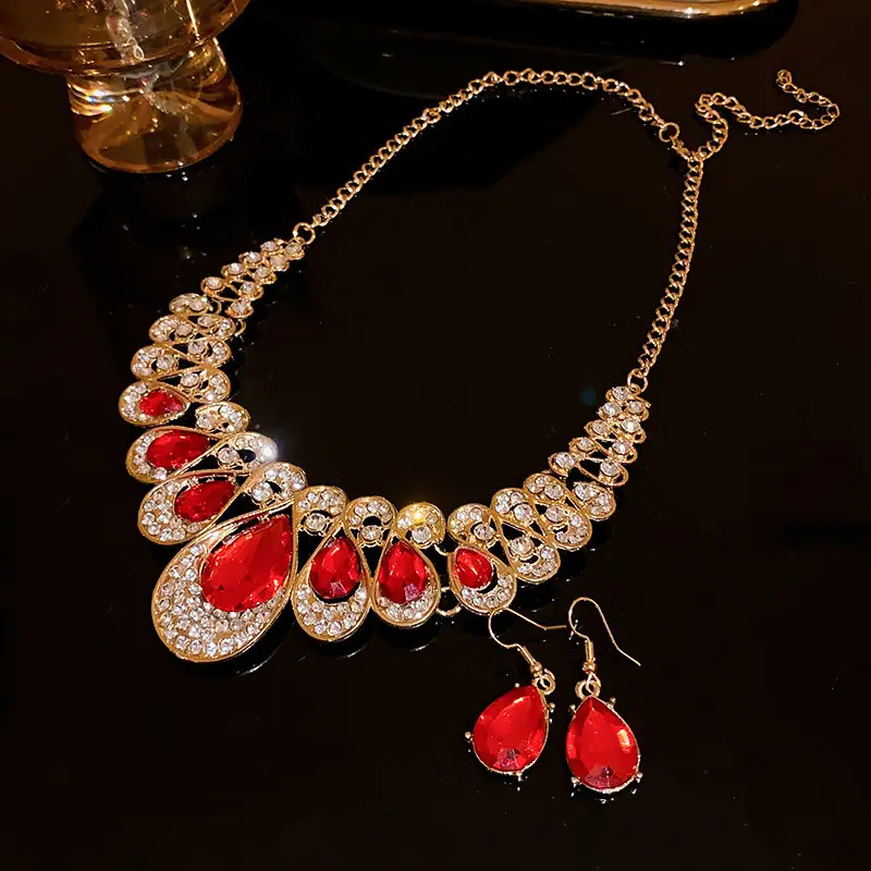 European and American style, featuring diamond-studded teardrop and geometric earrings and a necklace set, with a retro, courtly aesthetic, making it a fashionable and versatile accessory for women