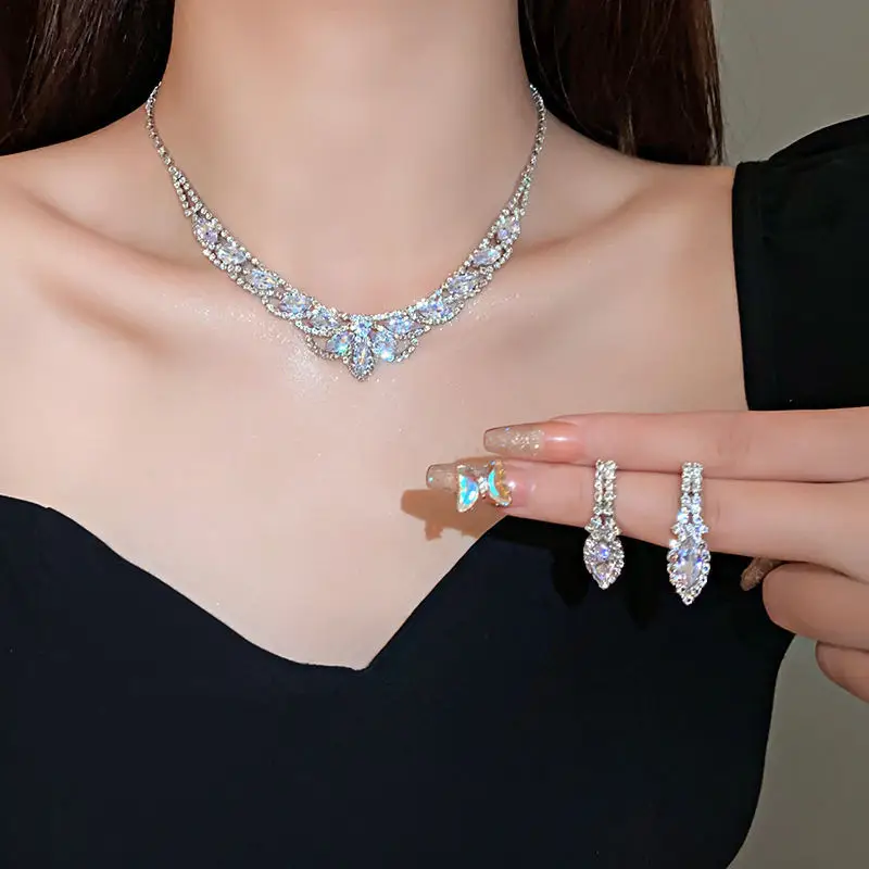 European and American style, featuring diamond-studded teardrop and geometric earrings and a necklace set, with a retro, courtly aesthetic, making it a fashionable and versatile accessory for women