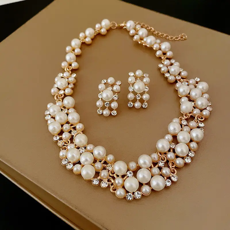 European and American style, featuring diamond-studded teardrop and geometric earrings and a necklace set, with a retro, courtly aesthetic, making it a fashionable and versatile accessory for women