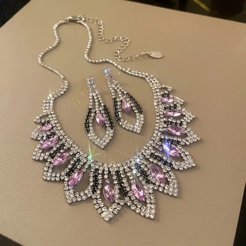 European and American style, featuring diamond-studded teardrop and geometric earrings and a necklace set, with a retro, courtly aesthetic, making it a fashionable and versatile accessory for women