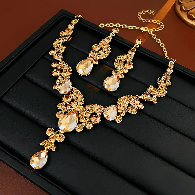 European and American style, featuring diamond-studded teardrop and geometric earrings and a necklace set, with a retro, courtly aesthetic, making it a fashionable and versatile accessory for women