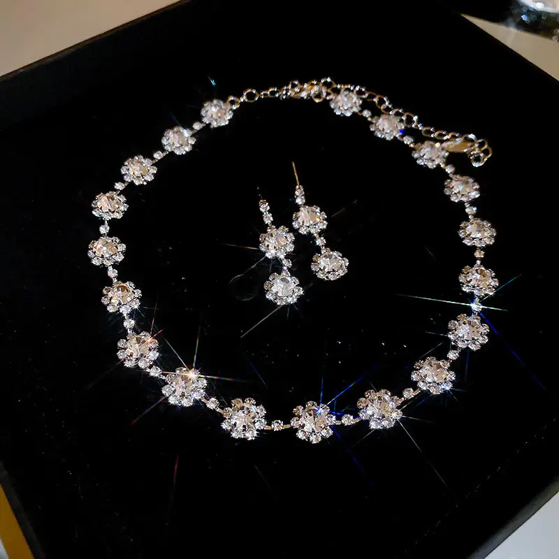 European and American style, featuring diamond-studded teardrop and geometric earrings and a necklace set, with a retro, courtly aesthetic, making it a fashionable and versatile accessory for women