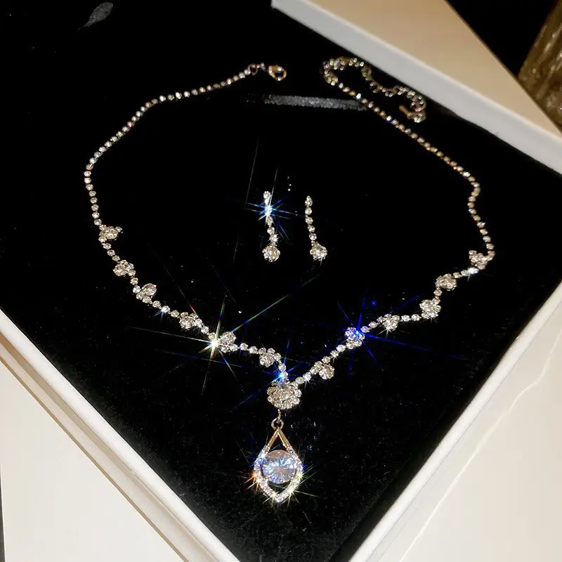 European and American style, featuring diamond-studded teardrop and geometric earrings and a necklace set, with a retro, courtly aesthetic, making it a fashionable and versatile accessory for women