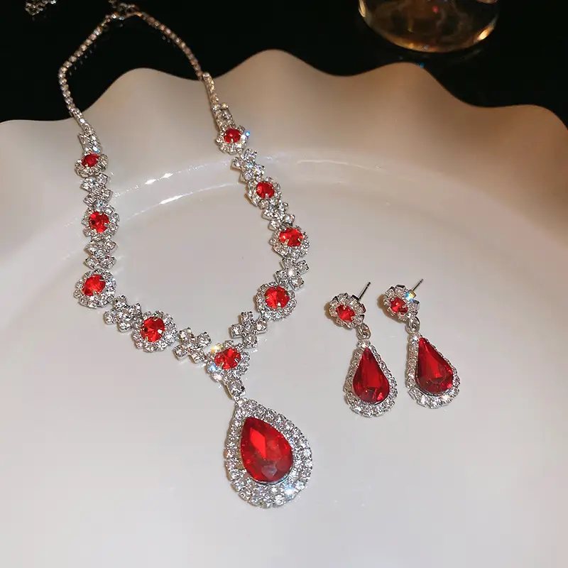 European and American style, featuring diamond-studded teardrop and geometric earrings and a necklace set, with a retro, courtly aesthetic, making it a fashionable and versatile accessory for women