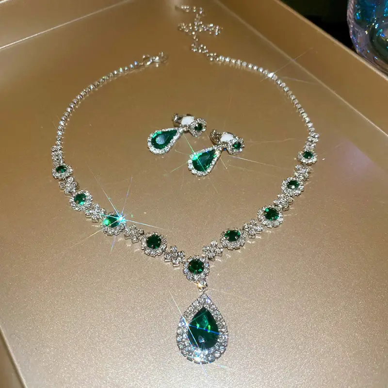 European and American style, featuring diamond-studded teardrop and geometric earrings and a necklace set, with a retro, courtly aesthetic, making it a fashionable and versatile accessory for women
