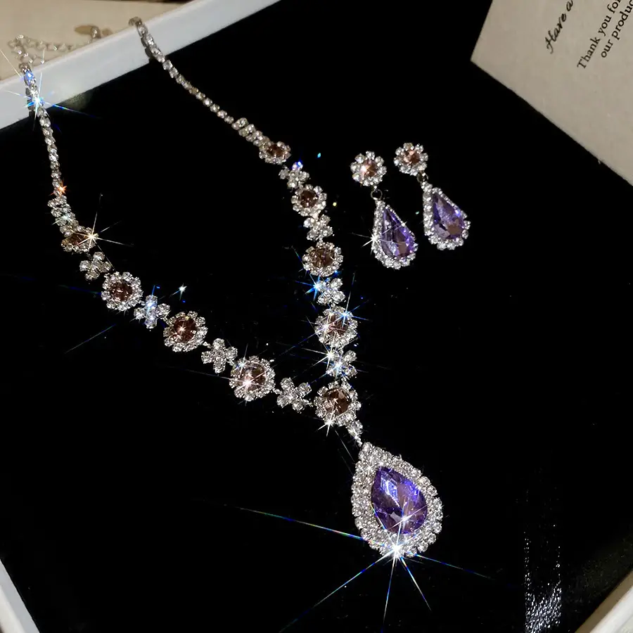 European and American style, featuring diamond-studded teardrop and geometric earrings and a necklace set, with a retro, courtly aesthetic, making it a fashionable and versatile accessory for women
