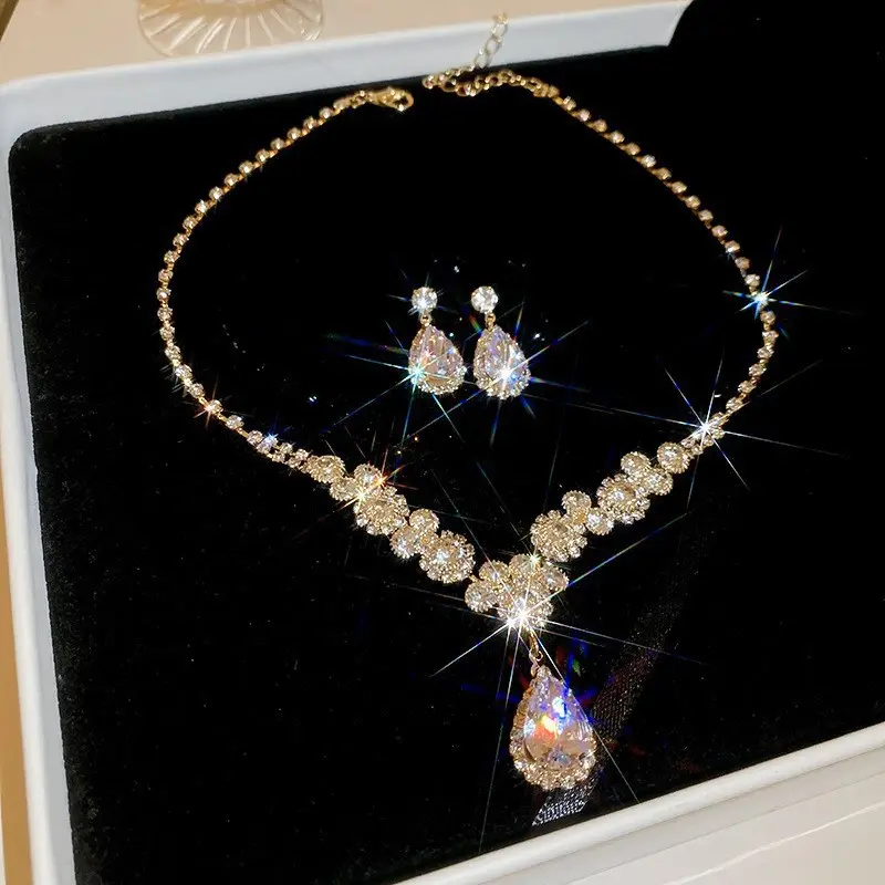European and American style, featuring diamond-studded teardrop and geometric earrings and a necklace set, with a retro, courtly aesthetic, making it a fashionable and versatile accessory for women