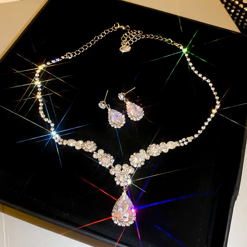 European and American style, featuring diamond-studded teardrop and geometric earrings and a necklace set, with a retro, courtly aesthetic, making it a fashionable and versatile accessory for women