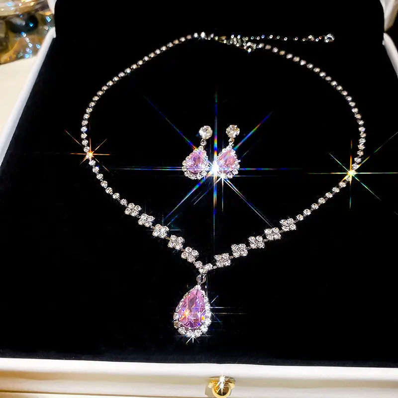 European and American style, featuring diamond-studded teardrop and geometric earrings and a necklace set, with a retro, courtly aesthetic, making it a fashionable and versatile accessory for women