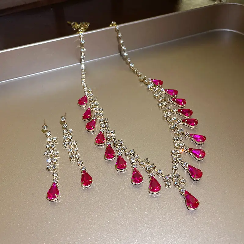 European and American style, featuring diamond-studded teardrop and geometric earrings and a necklace set, with a retro, courtly aesthetic, making it a fashionable and versatile accessory for women