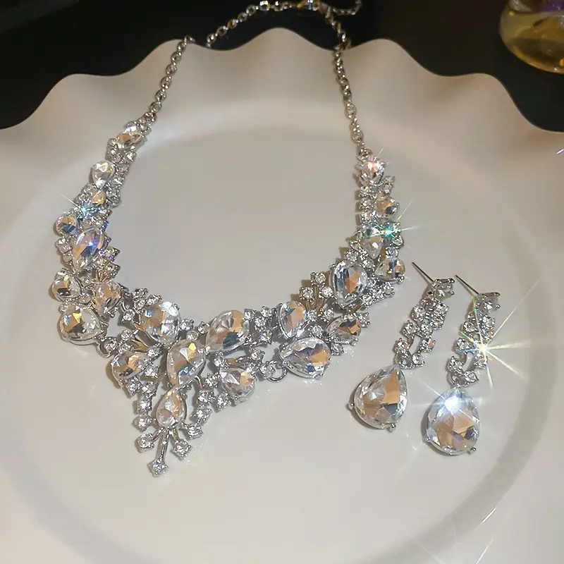 European and American style, featuring diamond-studded teardrop and geometric earrings and a necklace set, with a retro, courtly aesthetic, making it a fashionable and versatile accessory for women
