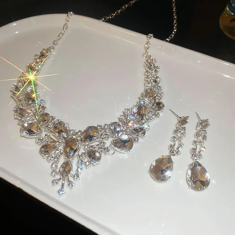 European and American style, featuring diamond-studded teardrop and geometric earrings and a necklace set, with a retro, courtly aesthetic, making it a fashionable and versatile accessory for women