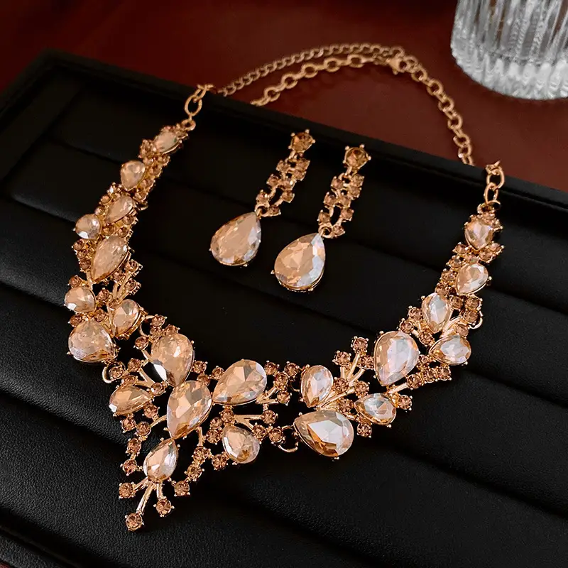 European and American style, featuring diamond-studded teardrop and geometric earrings and a necklace set, with a retro, courtly aesthetic, making it a fashionable and versatile accessory for women