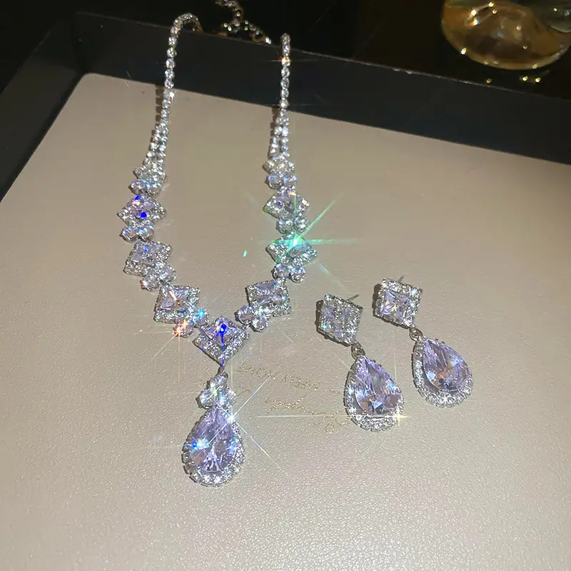 European and American style, featuring diamond-studded teardrop and geometric earrings and a necklace set, with a retro, courtly aesthetic, making it a fashionable and versatile accessory for women