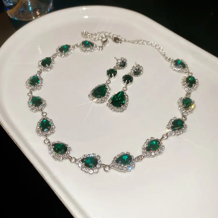 European and American style, featuring diamond-studded teardrop and geometric earrings and a necklace set, with a retro, courtly aesthetic, making it a fashionable and versatile accessory for women