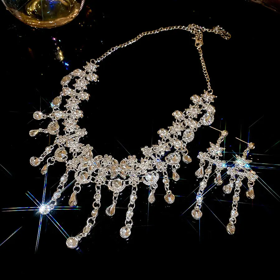 European and American style, featuring diamond-studded teardrop and geometric earrings and a necklace set, with a retro, courtly aesthetic, making it a fashionable and versatile accessory for women