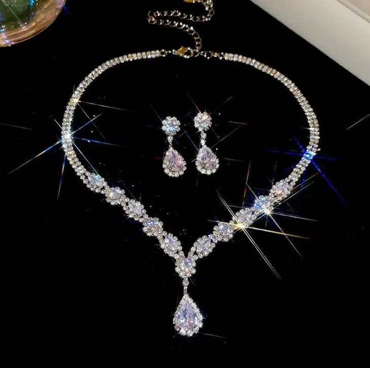 European and American style, featuring diamond-studded teardrop and geometric earrings and a necklace set, with a retro, courtly aesthetic, making it a fashionable and versatile accessory for women