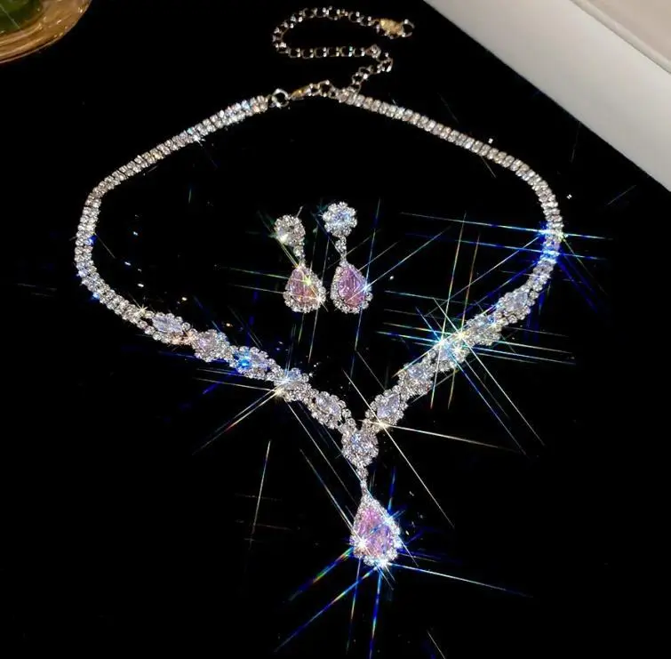 European and American style, featuring diamond-studded teardrop and geometric earrings and a necklace set, with a retro, courtly aesthetic, making it a fashionable and versatile accessory for women