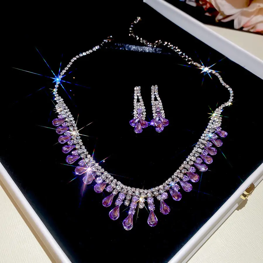 European and American style, featuring diamond-studded teardrop and geometric earrings and a necklace set, with a retro, courtly aesthetic, making it a fashionable and versatile accessory for women