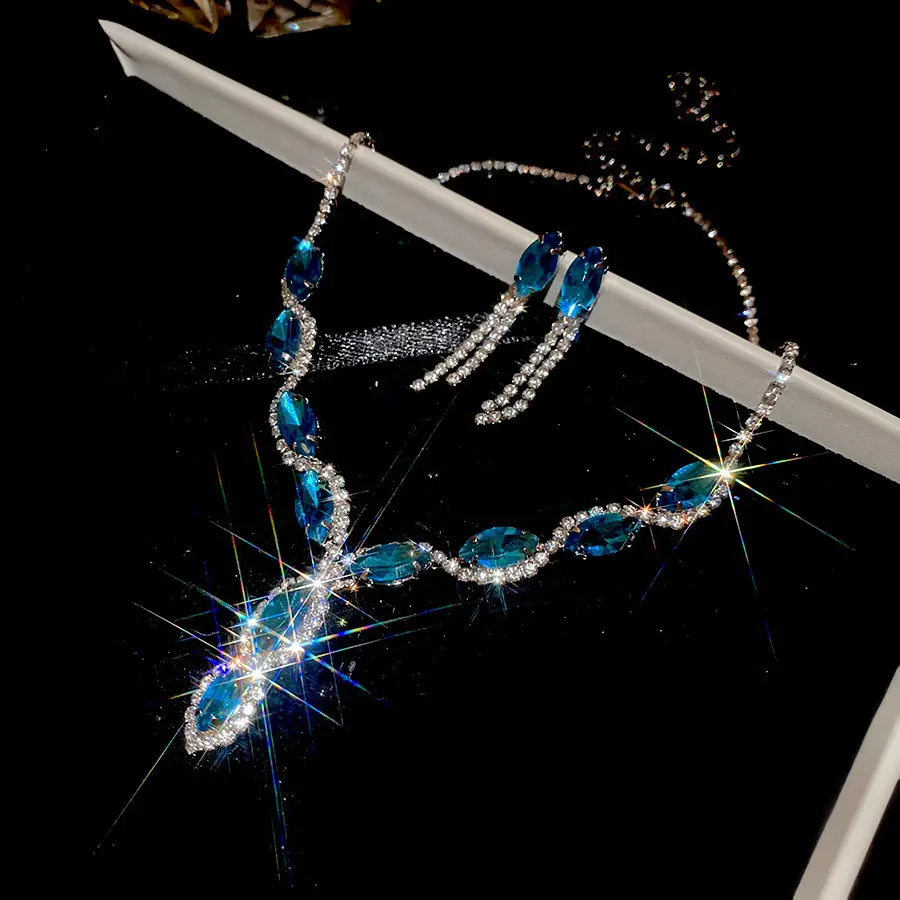 European and American style, featuring diamond-studded teardrop and geometric earrings and a necklace set, with a retro, courtly aesthetic, making it a fashionable and versatile accessory for women