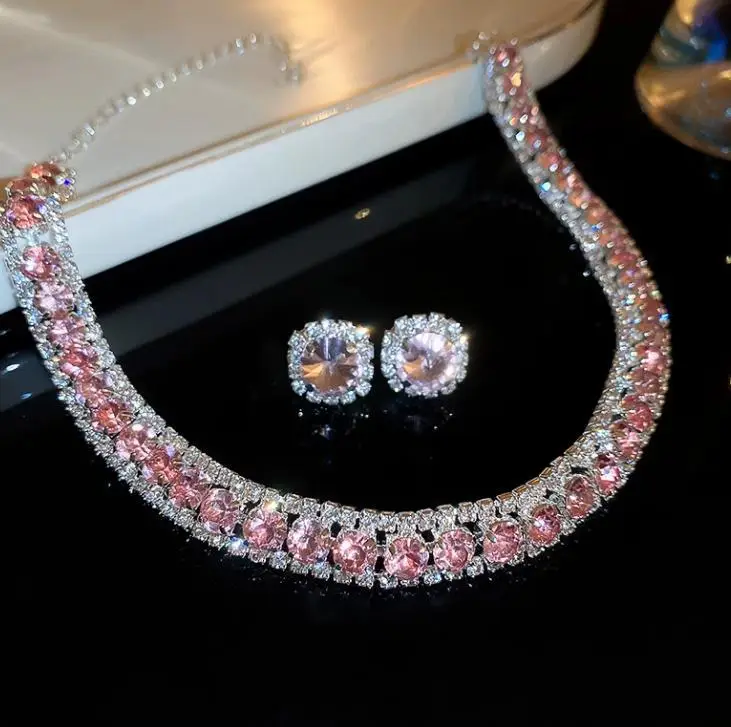 European and American style, featuring diamond-studded teardrop and geometric earrings and a necklace set, with a retro, courtly aesthetic, making it a fashionable and versatile accessory for women