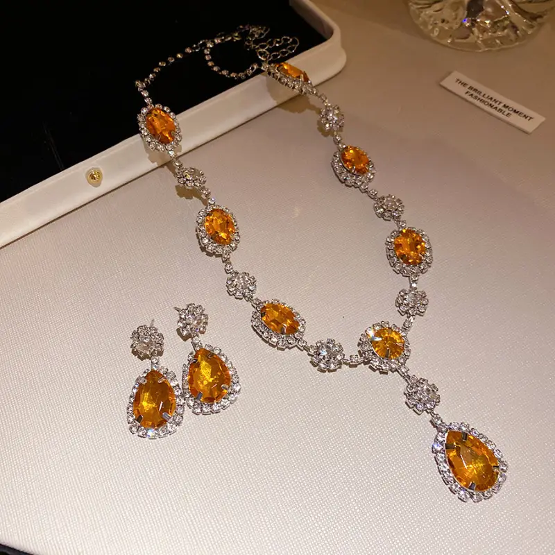 European and American style, featuring diamond-studded teardrop and geometric earrings and a necklace set, with a retro, courtly aesthetic, making it a fashionable and versatile accessory for women