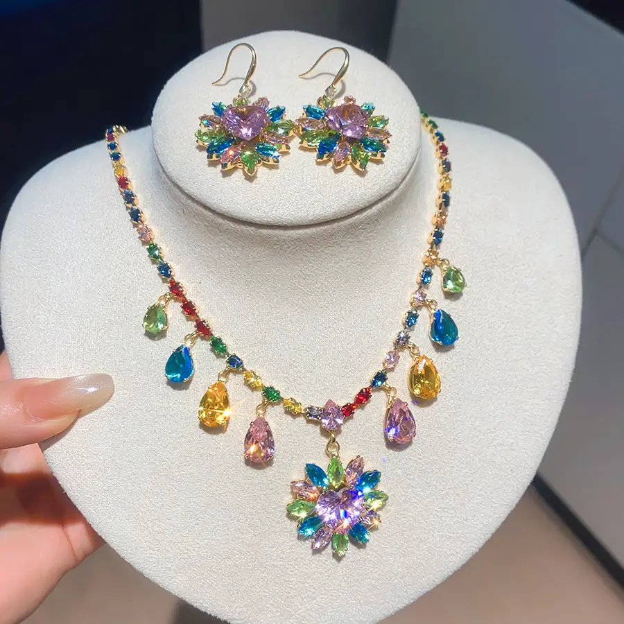 European and American style, featuring diamond-studded teardrop and geometric earrings and a necklace set, with a retro, courtly aesthetic, making it a fashionable and versatile accessory for women