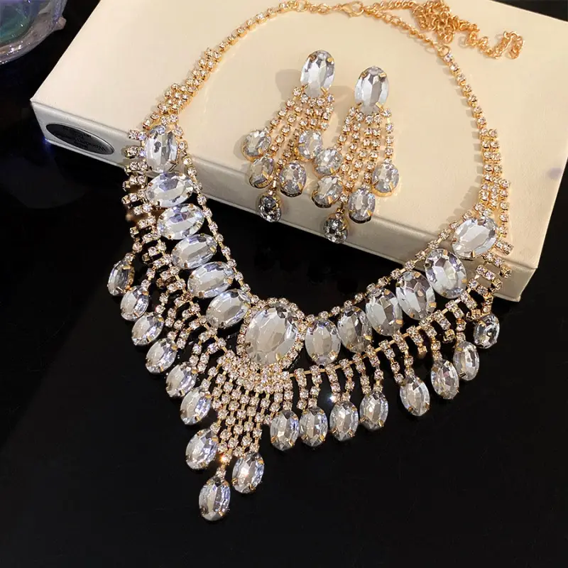European and American style, featuring diamond-studded teardrop and geometric earrings and a necklace set, with a retro, courtly aesthetic, making it a fashionable and versatile accessory for women