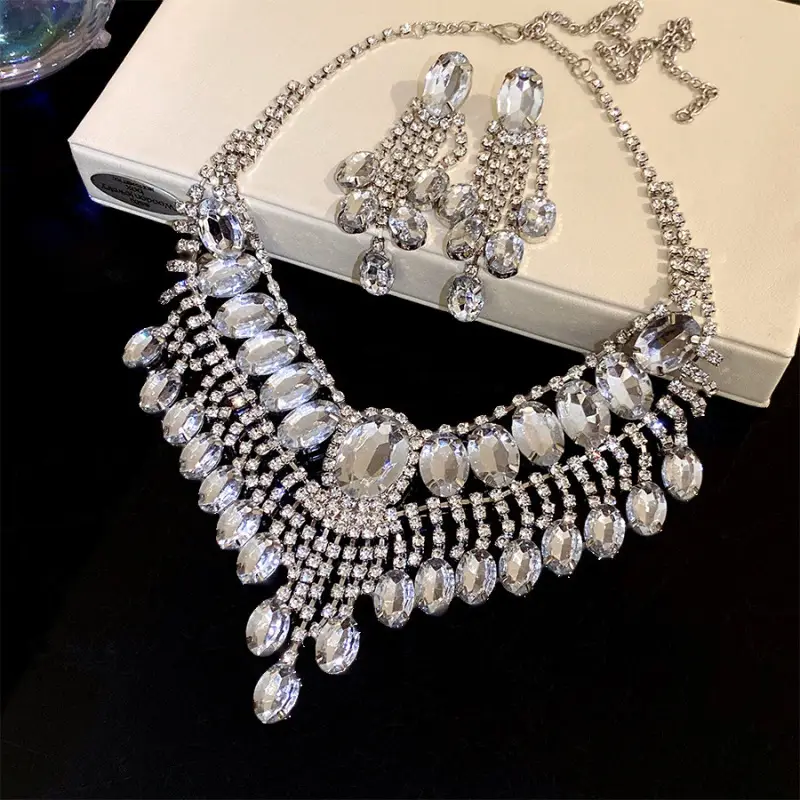 European and American style, featuring diamond-studded teardrop and geometric earrings and a necklace set, with a retro, courtly aesthetic, making it a fashionable and versatile accessory for women