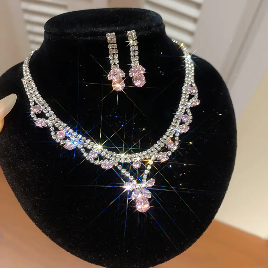 European and American style, featuring diamond-studded teardrop and geometric earrings and a necklace set, with a retro, courtly aesthetic, making it a fashionable and versatile accessory for women