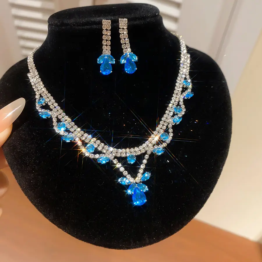 European and American style, featuring diamond-studded teardrop and geometric earrings and a necklace set, with a retro, courtly aesthetic, making it a fashionable and versatile accessory for women