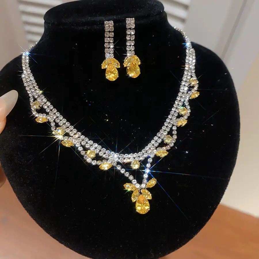 European and American style, featuring diamond-studded teardrop and geometric earrings and a necklace set, with a retro, courtly aesthetic, making it a fashionable and versatile accessory for women